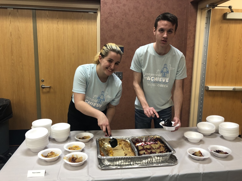 BMITE Students serving dessert